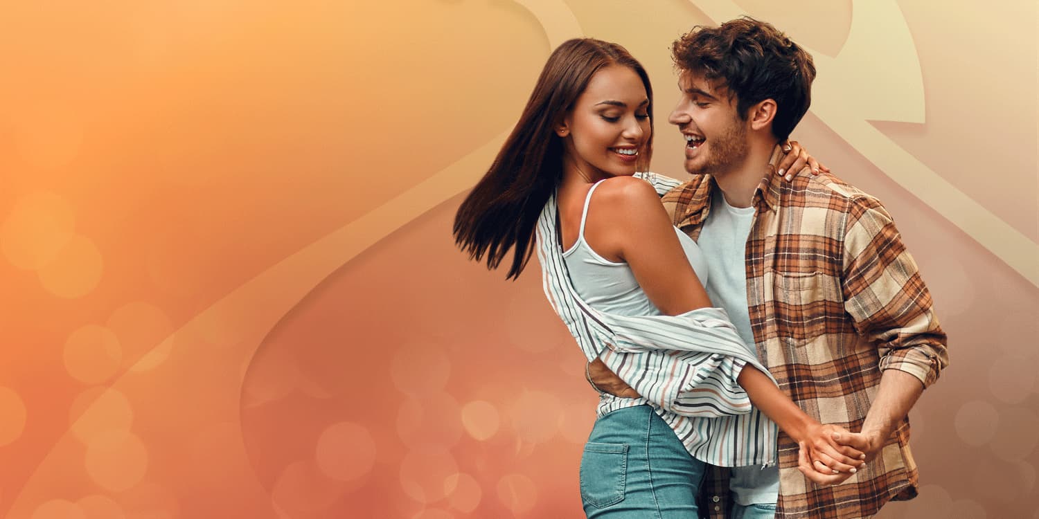 Young couple dancing in the Summer